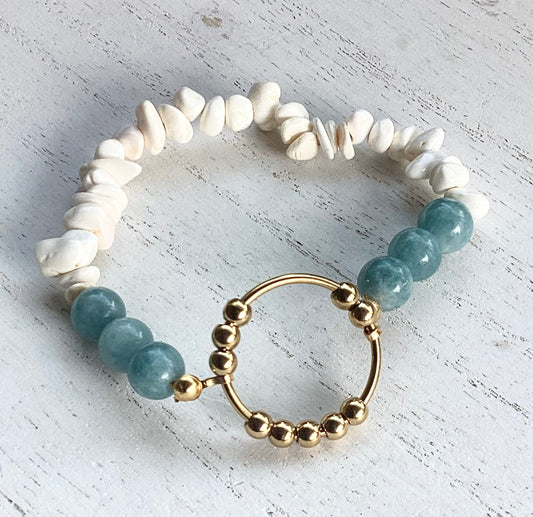 ## Ocean Breeze Fidget Bracelet: Aquamarine & Seashell Harmony